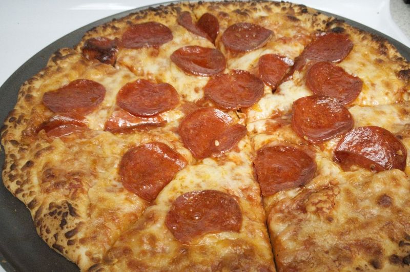 Photo of a Red Baron Brick Oven Crust pepperoni pizza.